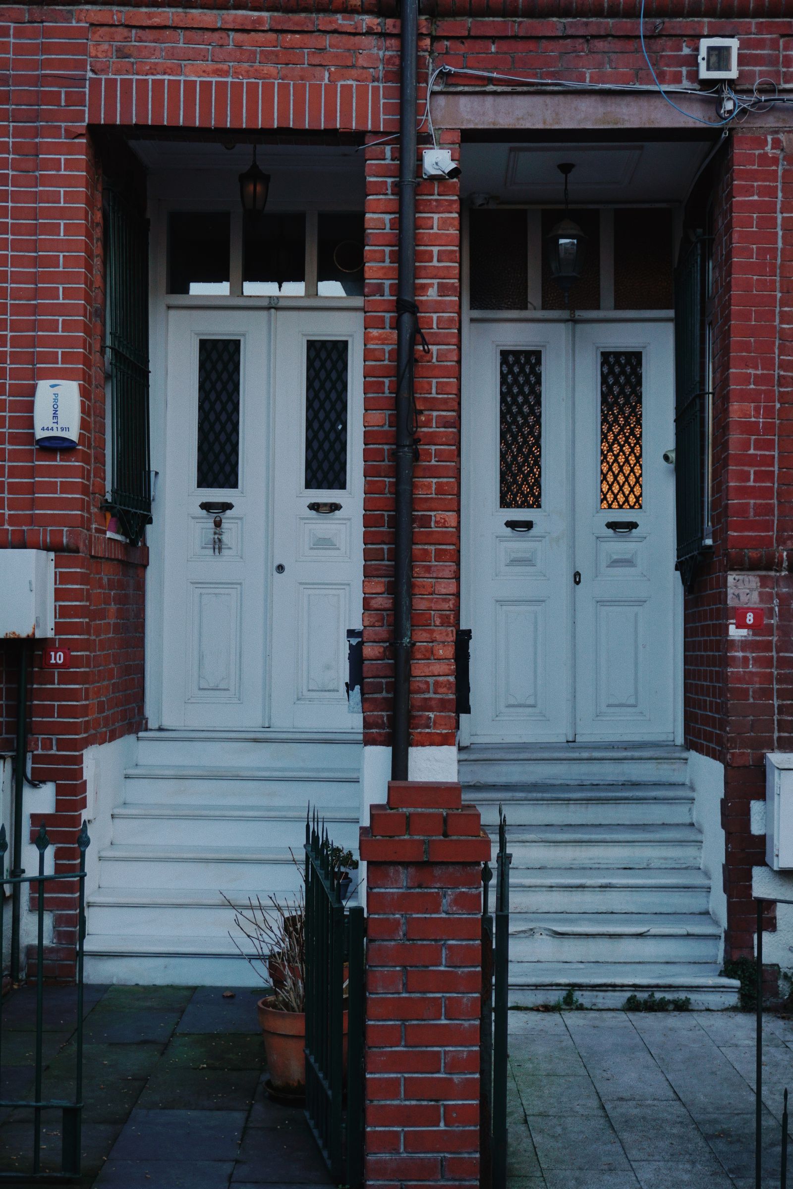 Modest Ontario semi-detached rental home with a driveway.